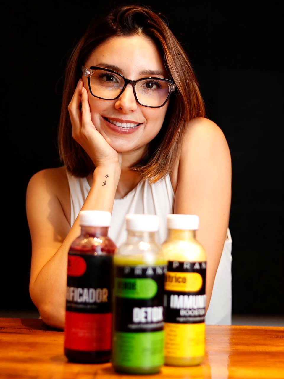Tres botellas de jugos prensados en frío Prana: Purificador, Detox e Immunity Booster